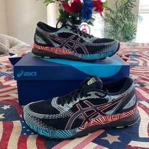 ASICS Gel Nimbus 21 Lite Show, size 9 1/2. Black/ Sun Coral.
